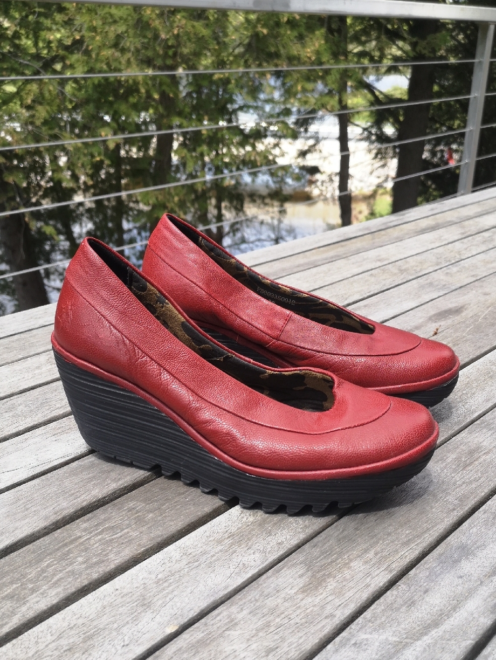Fly London wedge-heeled pumps